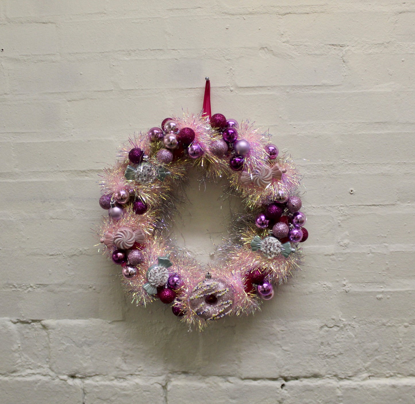 Kitsch Maximalist Candy and Donut themed Christmas wreath